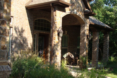 Design ideas for a traditional house exterior in Dallas.