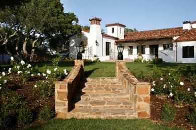 Inspiration for a mid-sized white one-story stucco exterior home remodel in Santa Barbara