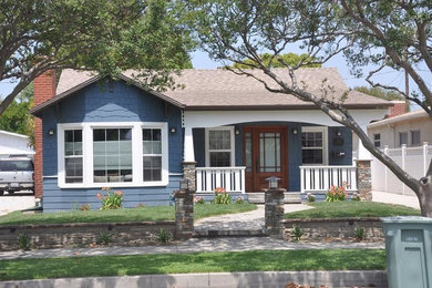 Example of a mid-sized blue one-story exterior home design in Los Angeles