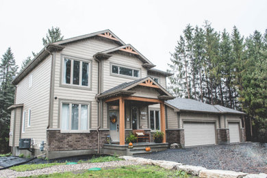 Example of an exterior home design in Ottawa