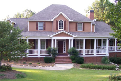 Example of a transitional beige three-story wood house exterior design in Atlanta