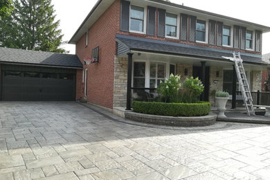 Brown exterior home idea in Toronto