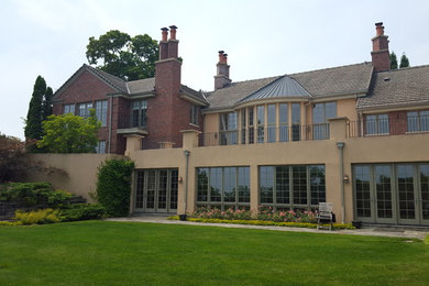 Example of a large classic two-story exterior home design in Chicago