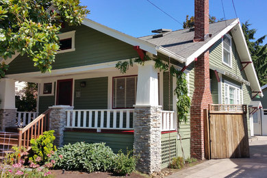 Inspiration for a mid-sized craftsman green exterior home remodel in Portland