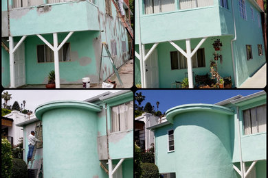 Mid-sized traditional green two-story stucco house exterior idea in Los Angeles with a hip roof and a shingle roof