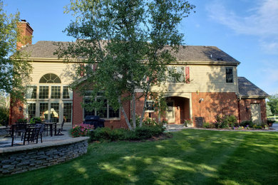 Example of an exterior home design in Milwaukee