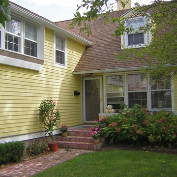 Exterior Painting - Yellow and White Cottage House in Cape May, NJ