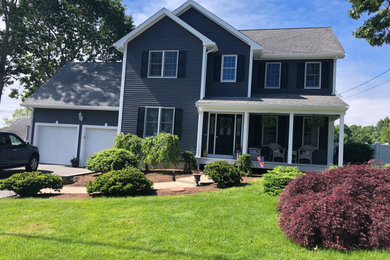 Minimalist gray vinyl house exterior photo in Providence