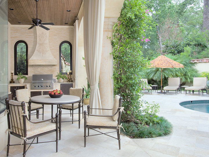 Huge elegant beige one-story stucco exterior home photo