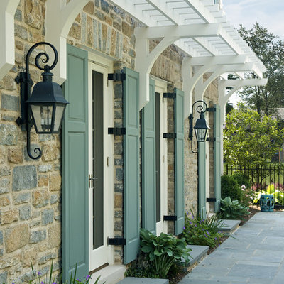 Inspiration for a timeless stone exterior home remodel in Cincinnati