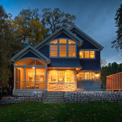 Elegant blue two-story wood exterior home photo in Milwaukee