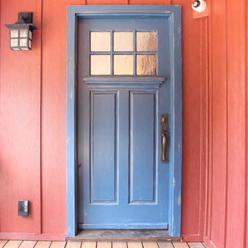 Exterior wood door with distressed finish