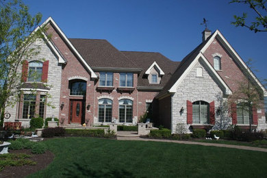 Tuscan exterior home photo in Chicago