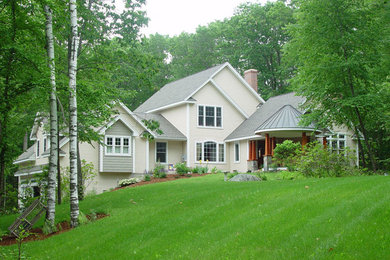 Mid-sized beige two-story vinyl gable roof idea in Bridgeport