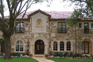 Tuscan exterior home photo in Dallas