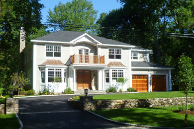 Inspiration for a large timeless two-story exterior home remodel in New York