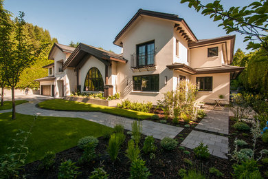 Example of a huge trendy exterior home design in Vancouver