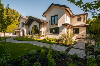 Inspiration for an expansive contemporary house exterior in Vancouver.