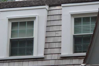 Example of a gray two-story exterior home design in Philadelphia