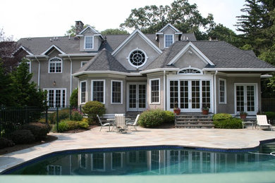 Example of an arts and crafts exterior home design in New York