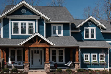 Inspiration for a large craftsman blue two-story wood exterior home remodel in Louisville