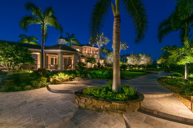 Example of a tuscan exterior home design in Tampa