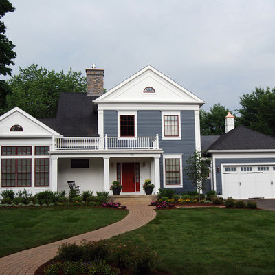 Example of a classic two-story mixed siding exterior home design in Bridgeport