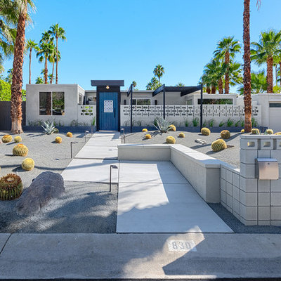 Example of a 1960s gray flat roof design in Los Angeles