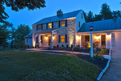 Example of a farmhouse exterior home design in Philadelphia