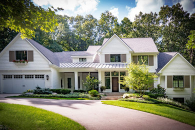 Inspiration for a country exterior home remodel in Grand Rapids