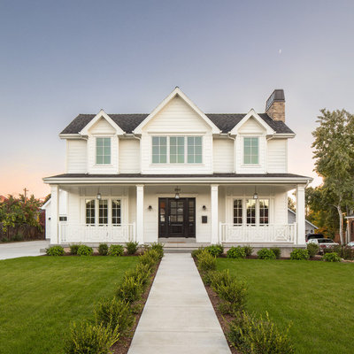 Inspiration for a cottage white two-story exterior home remodel in Salt Lake City with a shingle roof