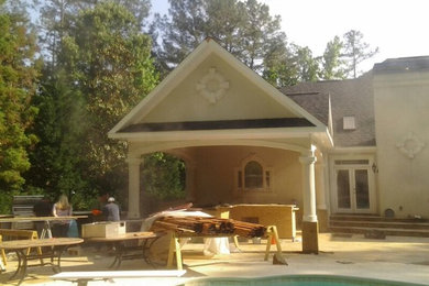 Example of a classic stucco exterior home design in Atlanta