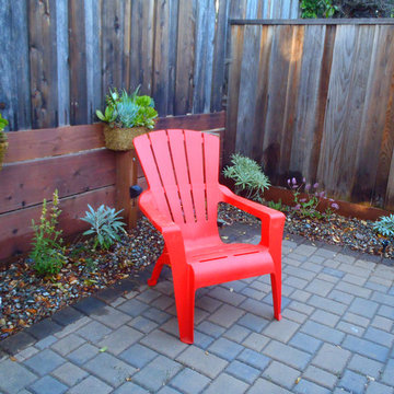 Feng Shui Oasis: Red Adirondack chairs