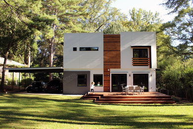 Example of a mid-sized minimalist white two-story concrete fiberboard exterior home design in Atlanta