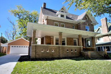 Example of a classic exterior home design in Omaha