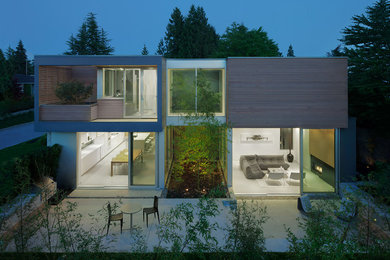 Design ideas for a modern house exterior in Vancouver.