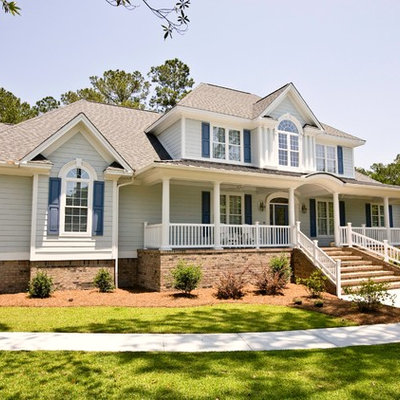 Elegant two-story wood exterior home photo in Wilmington