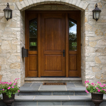 Fond Du Lac Stone Surrounds White Oak Front Door with Sidelights