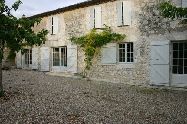 French Country Exterior by KitchenLab Interiors