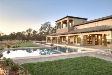 Example of a tuscan exterior home design in Sacramento