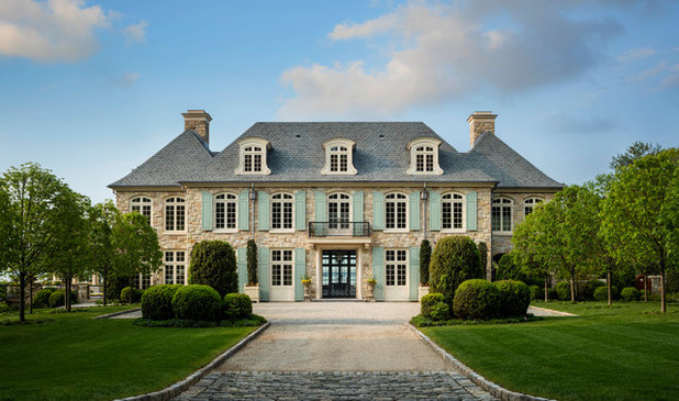 French Country Exterior by HOBBS INC