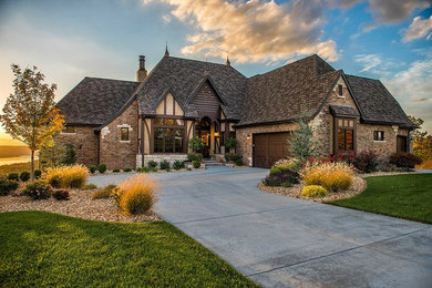 Example of an arts and crafts exterior home design in Kansas City