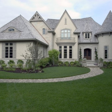 French Country Stone and Stucco House with Turret, Balcony and Eyebrow Windows