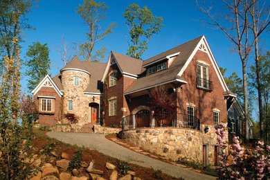 Traditional brick exterior home idea in Raleigh