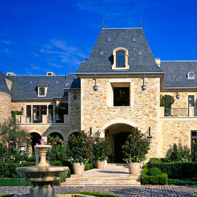 Traditional stone exterior home idea in Los Angeles