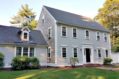 Large elegant gray two-story mixed siding exterior home photo in Boston with a shingle roof