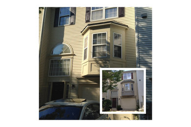 Mid-sized minimalist beige three-story vinyl exterior home photo in Baltimore
