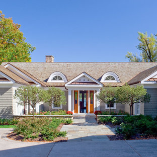 Inspiration for a mid-sized timeless one-story wood exterior home remodel in Boston