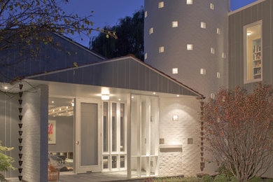 Modern gray two-story concrete fiberboard exterior home idea in Chicago