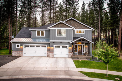 Inspiration for a large craftsman blue three-story concrete fiberboard exterior home remodel in Seattle